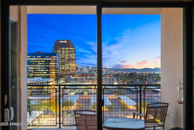 balcony featuring a city view