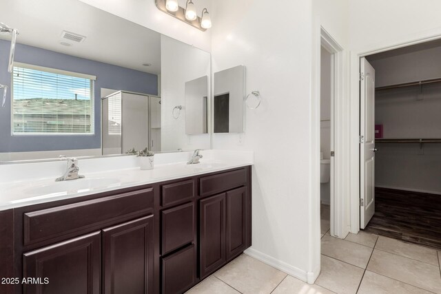 17532 W Copper Ridge Dr, Goodyear, AZ 85338 - full bathroom with a sink, tile patterned flooring, a shower stall, and visible vents