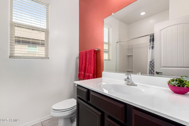 17532 W Copper Ridge Dr, Goodyear, AZ 85338 - full bath with vanity, tile patterned flooring, curtained shower, toilet, and baseboards