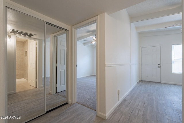 hallway featuring light hardwood / wood-style flooring