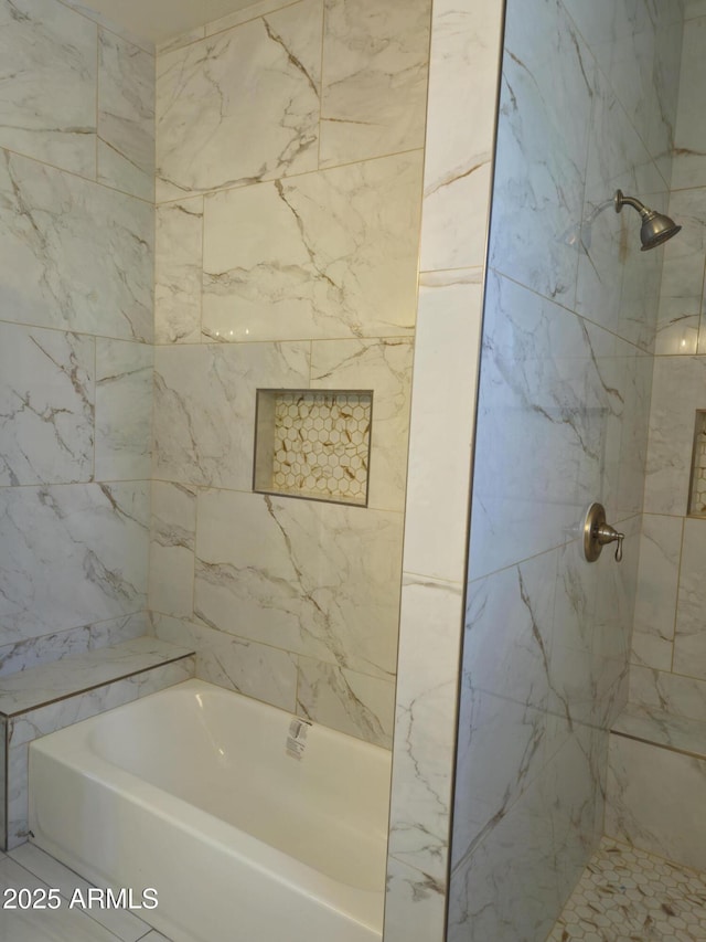 bathroom with a shower and a washtub