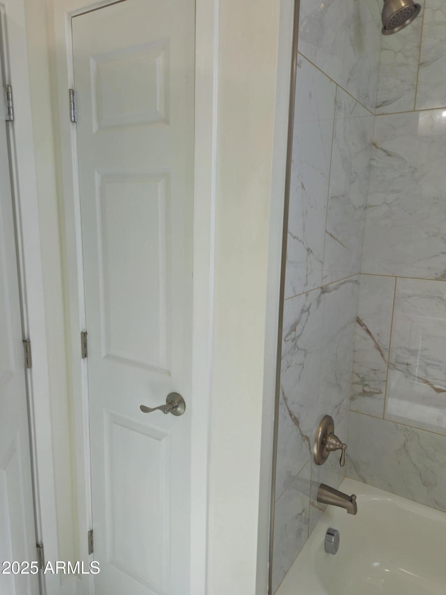 full bath with bathing tub / shower combination