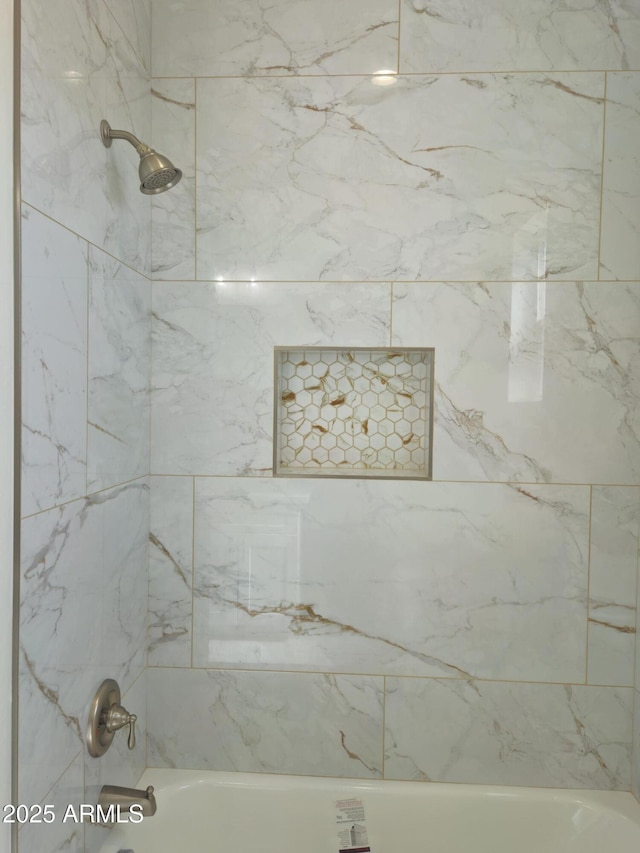 bathroom featuring shower / bathtub combination