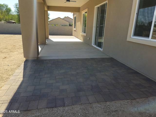 view of patio / terrace featuring a ceiling fan and a fenced backyard
