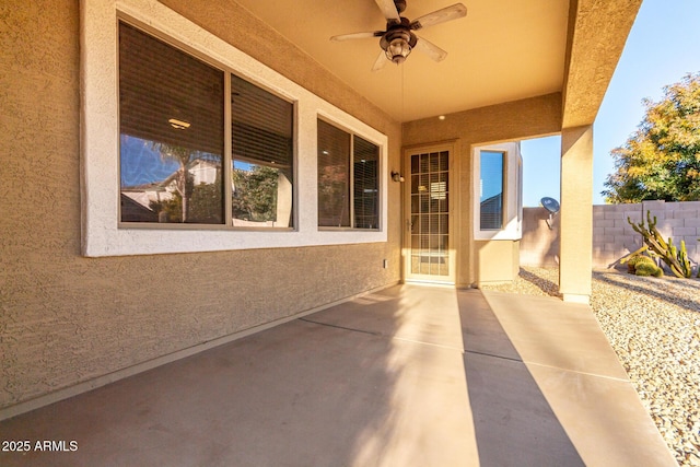 view of patio / terrace featuring ceiling fan