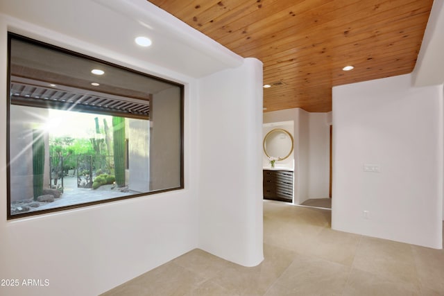1637 N Quartz Valley Rd, Scottsdale, AZ 85266 - empty room with wood ceiling, recessed lighting, and light tile patterned floors