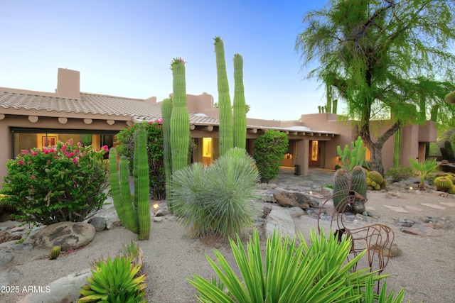 1637 N Quartz Valley Rd, Scottsdale, AZ 85266 - pueblo-style house featuring a tile roof and stucco siding