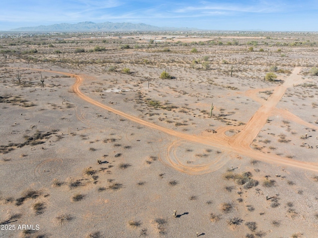 bird's eye view with a mountain view and a desert view