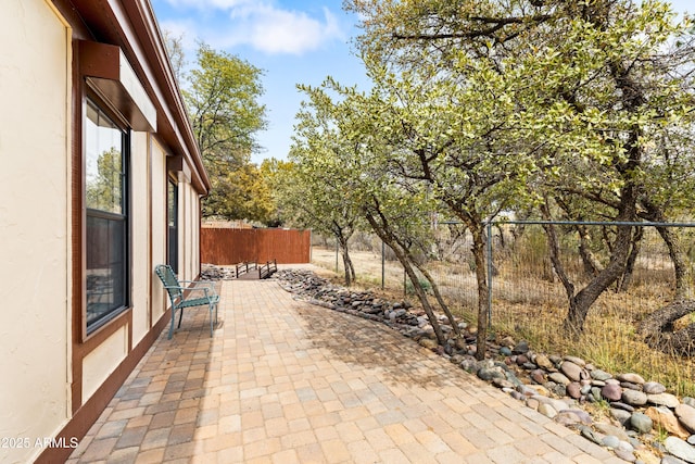 view of patio / terrace with fence
