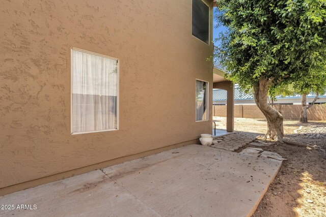 508 W San Angelo St, Gilbert, AZ 85233 - view of home's exterior with a patio and stucco siding
