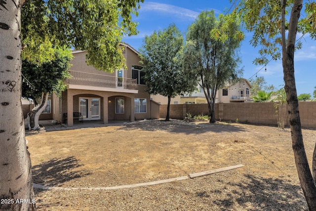 508 W San Angelo St, Gilbert, AZ 85233 - rear view of property with french doors, stucco siding, and a balcony