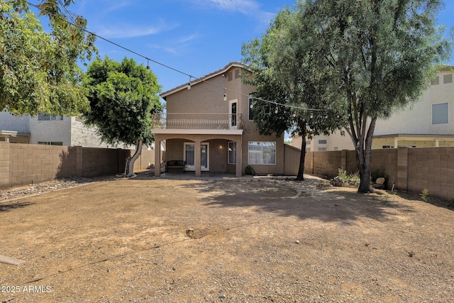 508 W San Angelo St, Gilbert, AZ 85233 - back of house featuring a fenced backyard, a balcony, stucco siding, and a patio area