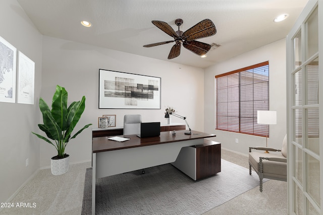 carpeted office with ceiling fan, baseboards, visible vents, and recessed lighting