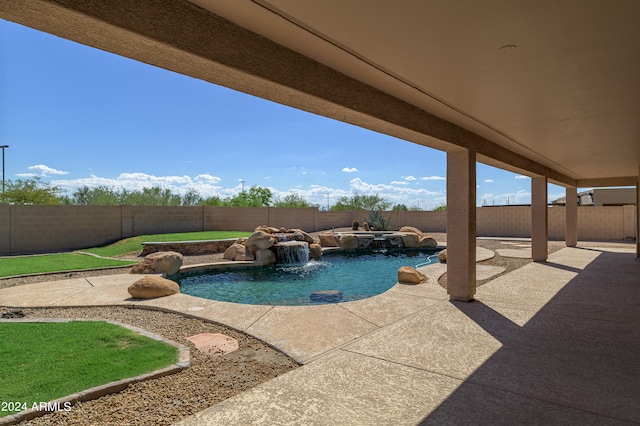 view of pool with a fenced in pool, a fenced backyard, and a patio