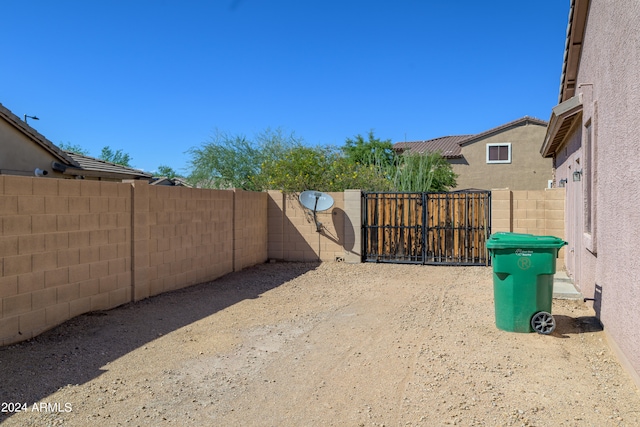 view of yard with a gate and fence