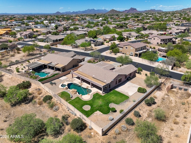 birds eye view of property featuring a residential view and a mountain view