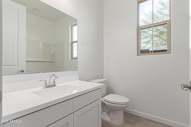 full bathroom featuring a shower, toilet, vanity, wood finished floors, and baseboards