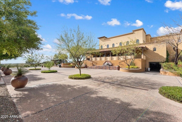 exterior space featuring concrete driveway