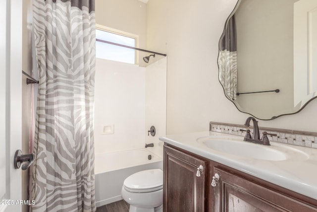 full bath with shower / bath combination with curtain, vanity, and toilet