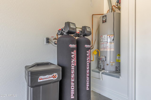 utility room featuring gas water heater