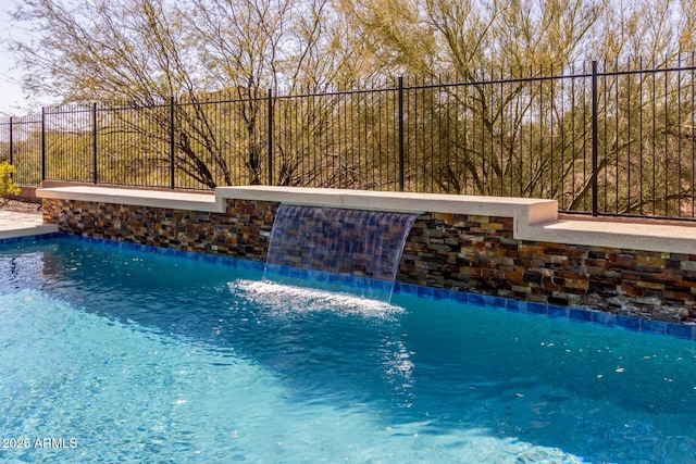 view of pool featuring fence and a fenced in pool