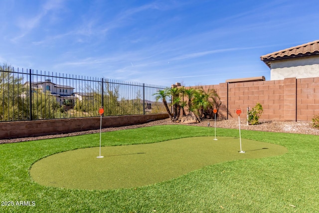 view of home's community featuring a fenced backyard