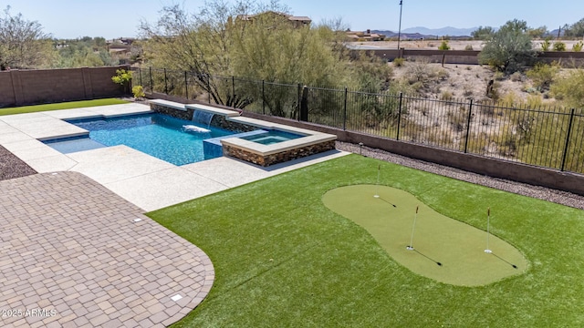 view of swimming pool with an in ground hot tub, a fenced backyard, a fenced in pool, and a patio