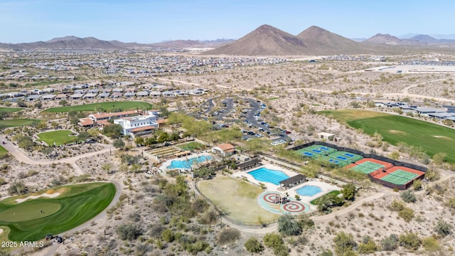 bird's eye view with golf course view and a mountain view