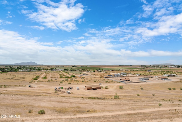 drone / aerial view with a mountain view and a rural view