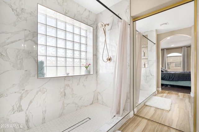 bathroom featuring walk in shower