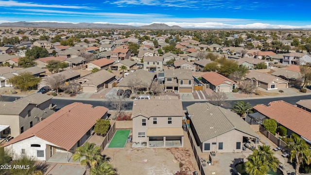 birds eye view of property featuring a mountain view