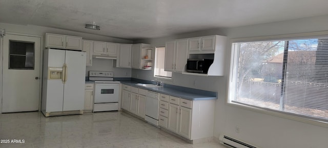 kitchen featuring under cabinet range hood, white appliances, a sink, white cabinets, and baseboard heating