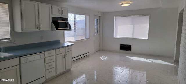 kitchen featuring a baseboard heating unit, white cabinetry, heating unit, dishwasher, and stainless steel microwave