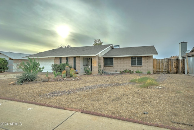 ranch-style house with a garage