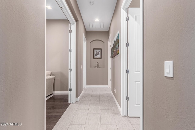 hallway featuring light hardwood / wood-style floors