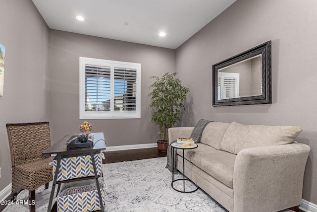 living room with light hardwood / wood-style flooring