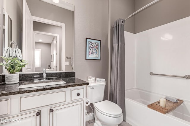 full bathroom with vanity, toilet, and shower / bath combo with shower curtain