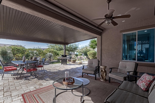 view of patio featuring an outdoor hangout area, ceiling fan, and a grill