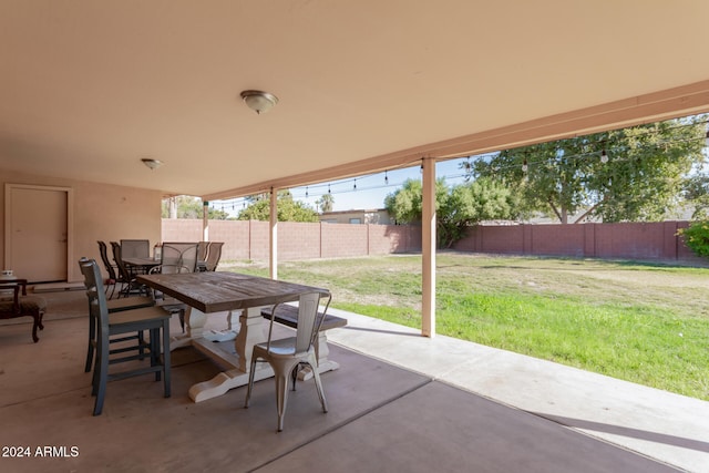 view of patio / terrace with a fenced backyard and outdoor dining area