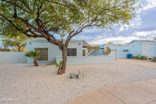 view of front of home featuring a garage