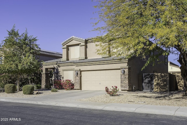 view of front of home with a garage