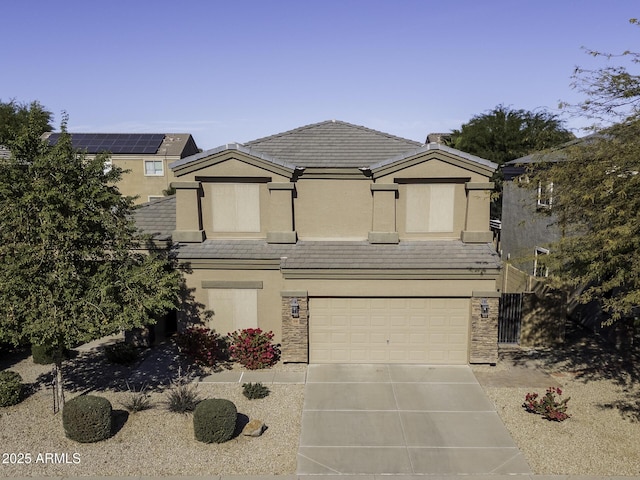 view of front of home with a garage