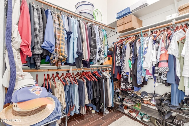 spacious closet with wood tiled floor