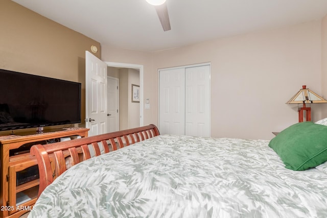 bedroom with a ceiling fan and a closet