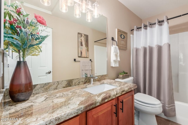 bathroom featuring shower / tub combo, tile patterned flooring, vanity, and toilet