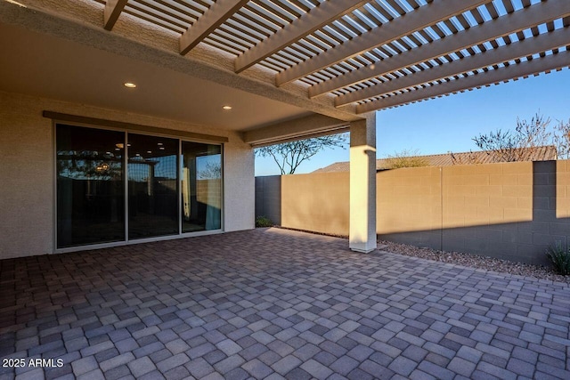 view of patio featuring a pergola