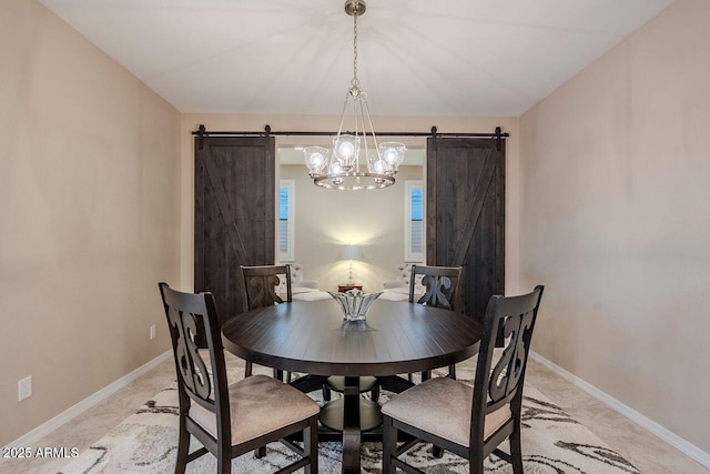 dining space with a barn door