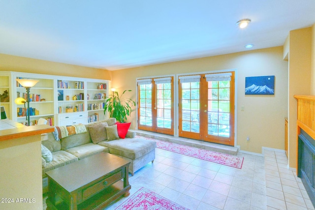 tiled living room featuring french doors