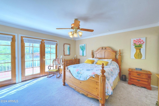 carpeted bedroom with ceiling fan, access to exterior, and ornamental molding