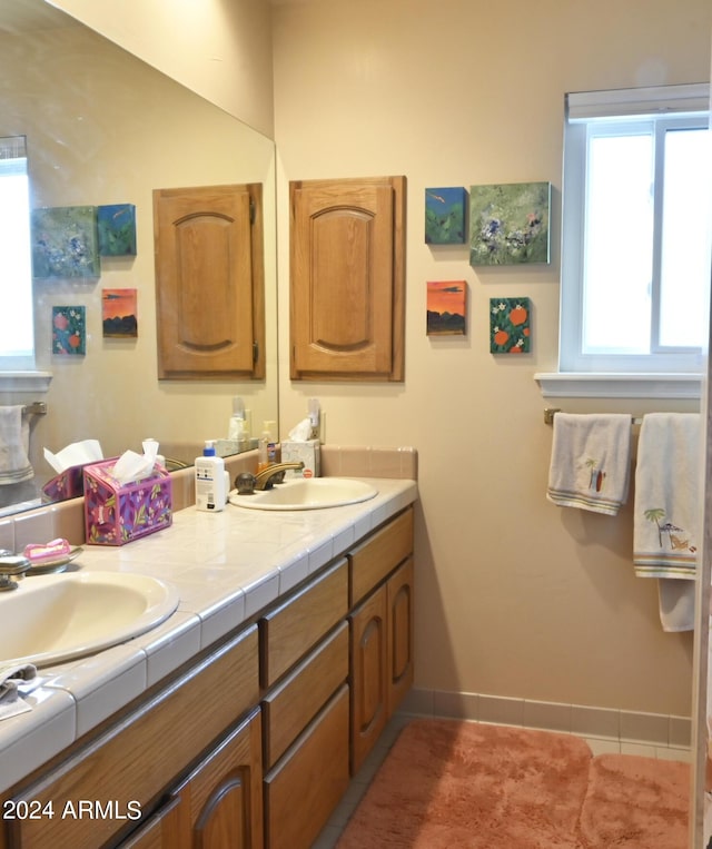 bathroom featuring vanity and tile patterned floors